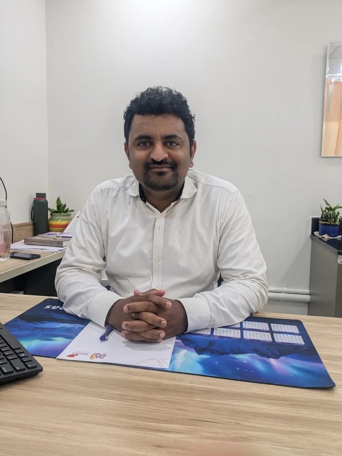 Dr Abhishek G P at his consultation desk